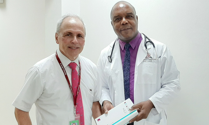 OB/GYN specialist Philip Lahrmann, MD ’81 (left)