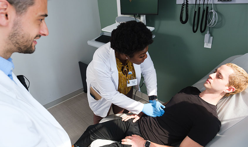 doctor examining patient