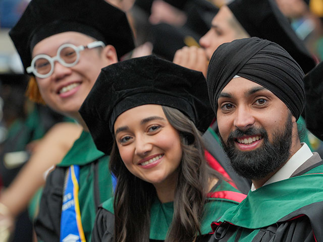 som commencement three graduates