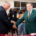 Charles Modica and Patrick Adams cut a ribbon at the dedication of the new Patrick F. Adams Hall in 2011. 